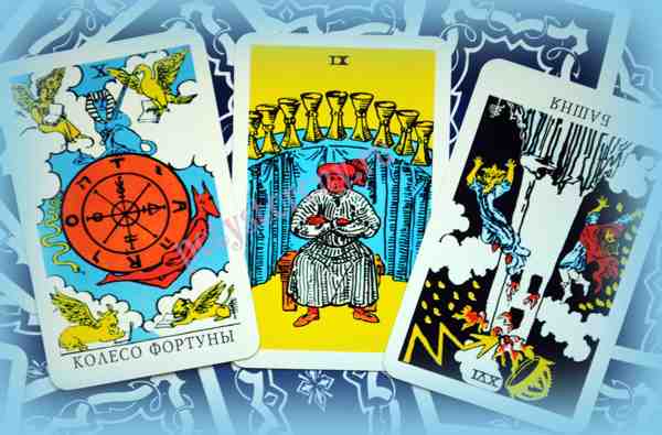 nine of cups, wheel of fortune, tower